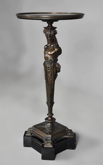 Patinated bronze pedestal table with Hermes-1