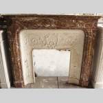 Transition style fireplace with bronze ornaments