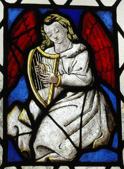 Two stained glasses elements with a harpist and a guitarist angels-0