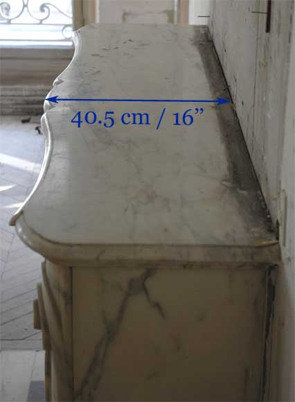 Antique Louis XV style fireplace in a Grey Panazeau marble