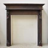 Antique Neo-gothic style wood fireplace with troubadours