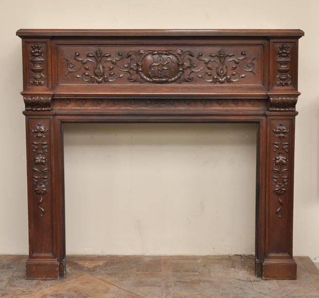 Antique Napoleon III style oak wood fireplace with 