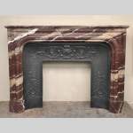 Antique Louis XIV style fireplace in Campan Rubane marble