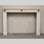 Antique Louis XVI period fireplace in white Sivex marble and gilded bronze