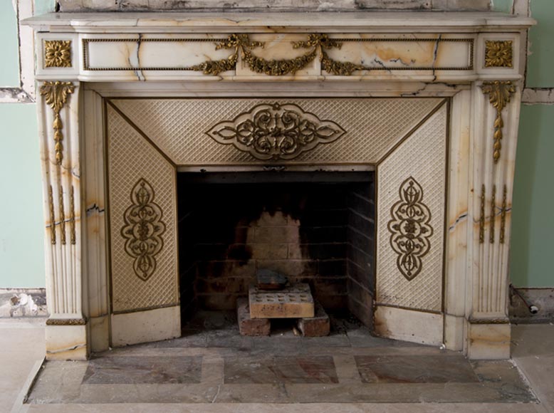 Very beautiful antique Louis XVI style fireplace made out of Panazeau marble with gilded bronze ornaments-0