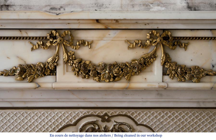 Very beautiful antique Louis XVI style fireplace made out of Panazeau marble with gilded bronze ornaments-1