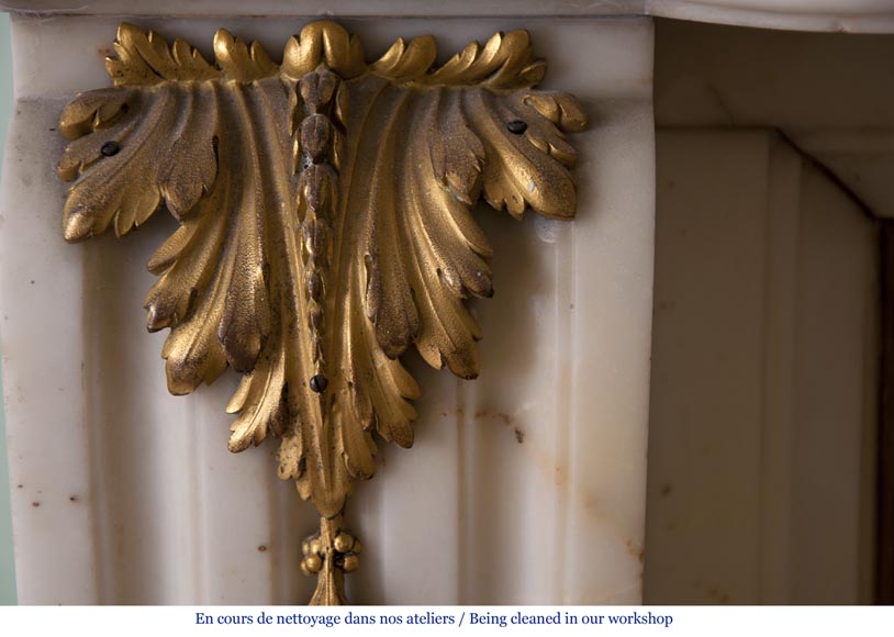 Very beautiful antique Louis XVI style fireplace made out of Panazeau marble with gilded bronze ornaments-7