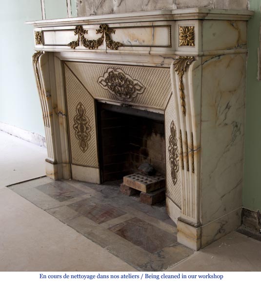 Very beautiful antique Louis XVI style fireplace made out of Panazeau marble with gilded bronze ornaments-11