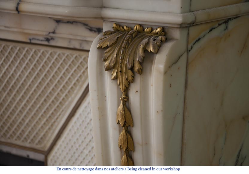 Very beautiful antique Louis XVI style fireplace made out of Panazeau marble with gilded bronze ornaments-13