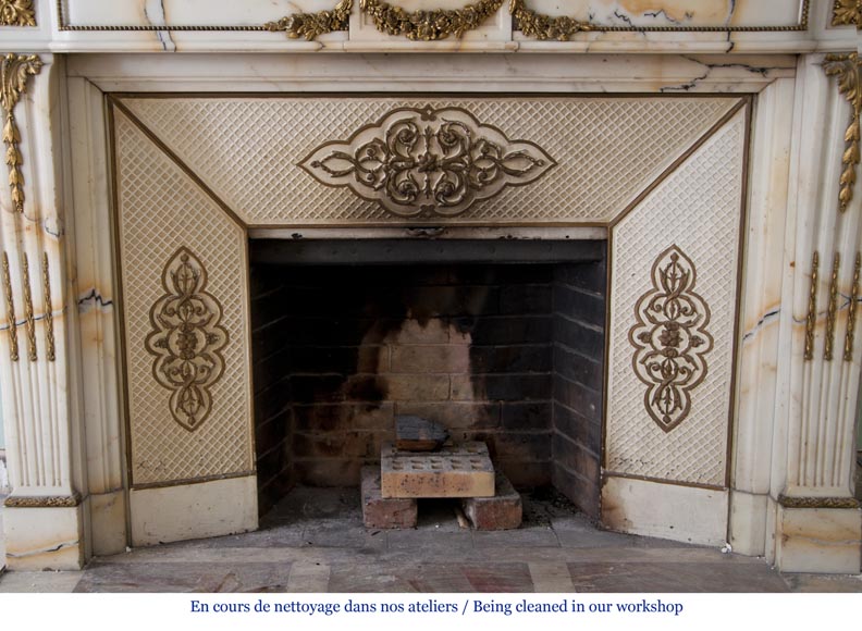 Very beautiful antique Louis XVI style fireplace made out of Panazeau marble with gilded bronze ornaments-15