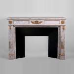 Beautiful antique Louis XVI style fireplace made out of Grey Paonazzo with gilded bronze ornaments