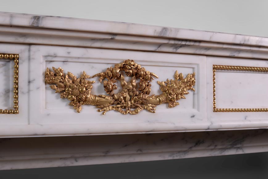 Beautiful antique Louis XVI style fireplace made out of Grey Paonazzo with gilded bronze ornaments-1