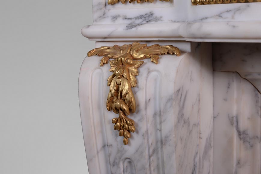Beautiful antique Louis XVI style fireplace made out of Grey Paonazzo with gilded bronze ornaments-4