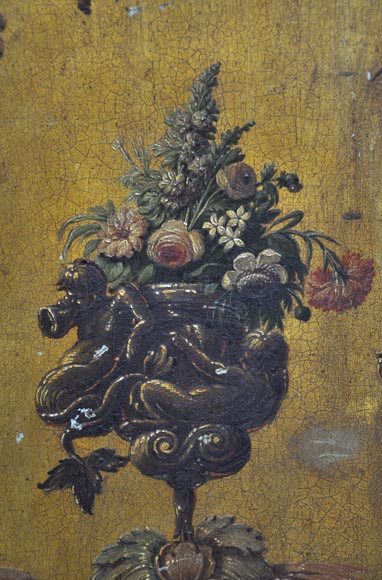 Double door with frame with putti and flowers decor on gold painting background-2