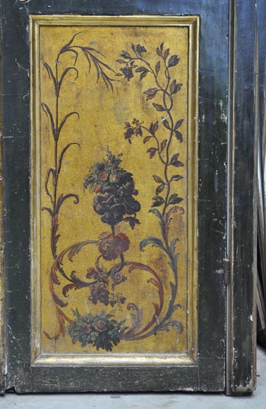 Double door with frame with putti and flowers decor on gold painting background-11