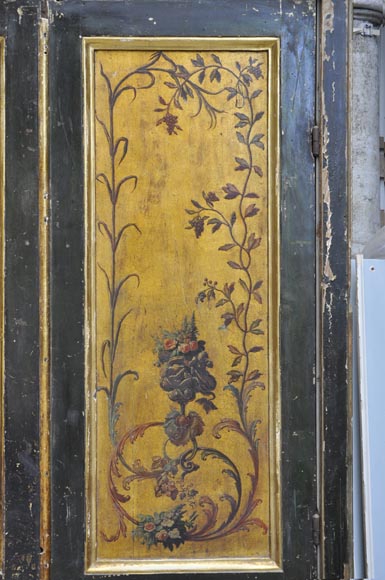 Double door with frame with putti and flowers decor on gold painting background-12