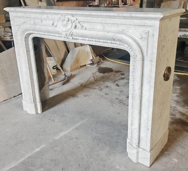 Louis XIV-style fireplace in Carrara marble, featuring a beaded molding Louis XIV-style fireplace in Carrara marble, featuring a beaded molding-8