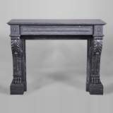 Antique Napoleon III style fireplace with lion's paws in Blue Turquin marble