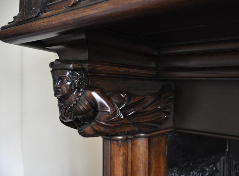 Monumental antique Neo-Gothic style fireplace with hood made out of carved walnut and courtly scenes-4
