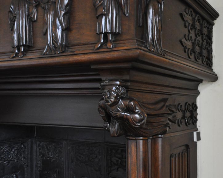Monumental antique Neo-Gothic style fireplace with hood made out of carved walnut and courtly scenes-6