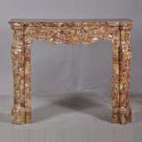 Pompadour style fireplace in Breche d'Alep marble
