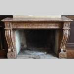 Beautiful antique fireplace in Louis Phillipe style carved out of Brocatelle marble