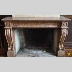 Beautiful antique fireplace in Louis Phillipe style carved out of Brocatelle marble