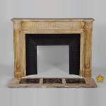 Beautiful antique Louis XVI style fireplace in Yellow from Siena marble with half-columns