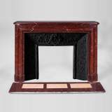 Antique Louis XIV style fireplace in Red Griotte marble with its cast iron insert