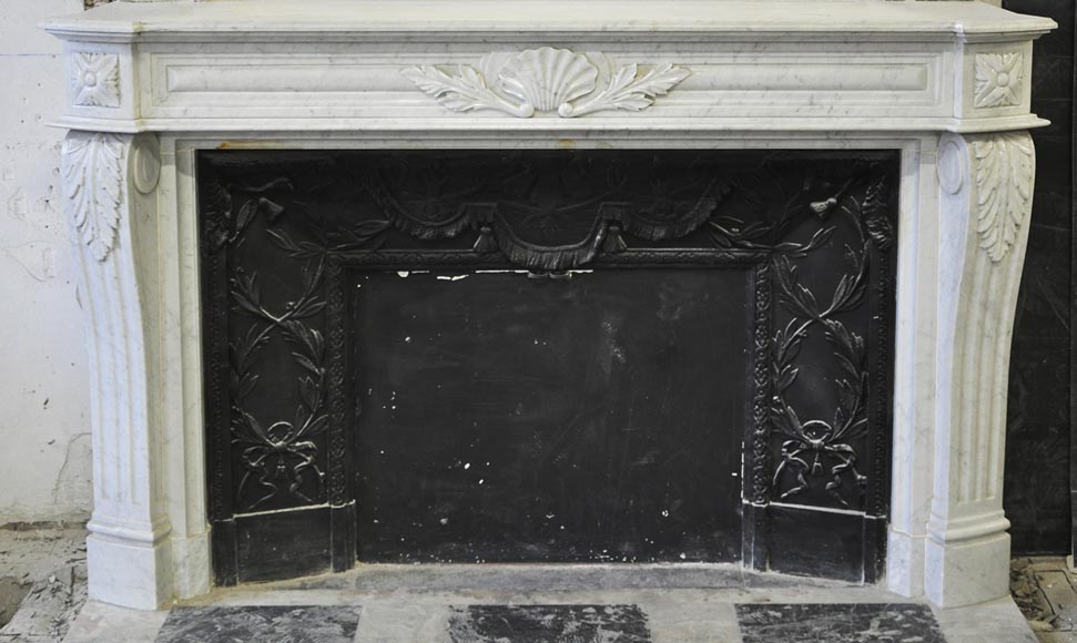Large Louis XVI style fireplace in white Carrara marble with its cast iron insert and its overmantel mirror-1