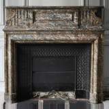 Important antique Louis XIV style fireplace in Red from the North marble with acroterion