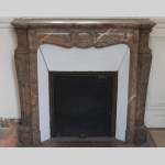 Beautiful Antique Pompadour Fireplace in Enjugerais Pink marble, with its original enameled insert, 19th c.