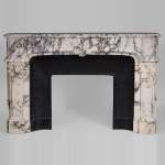 Antique Regence style fireplace in Panazeau marble