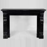 Beautiful antique Napoleon III fireplace with windings and acanthus leaves in Black Belgium marble
