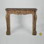 Antique Louis XV style fireplace, Pompadour model, in Brocatelle du Jura marble