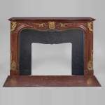 Antique Napoleon III period fireplace in Antique Red marble and gilded bronze ornaments