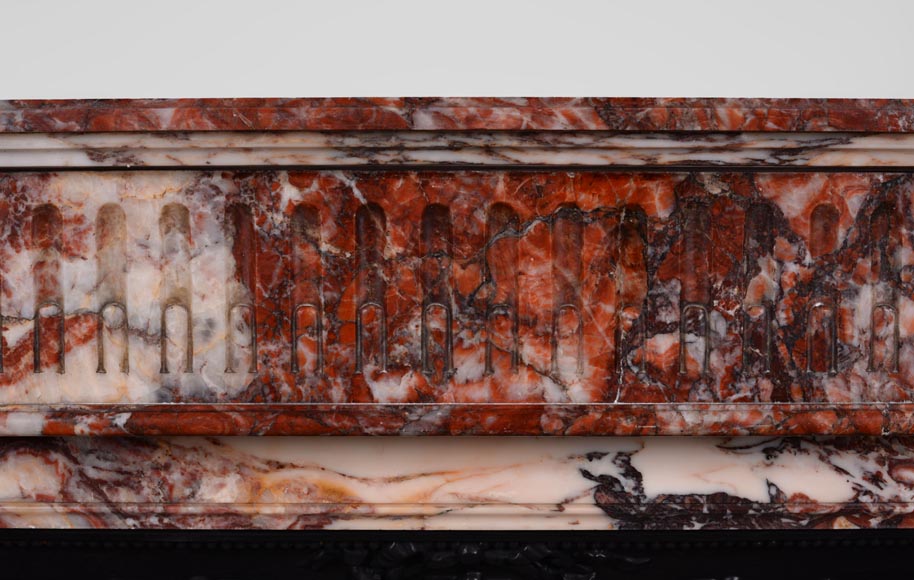 Beautiful antique Louis XVI style fireplace with flutings in Onyx rouge with its cast iron insert-1
