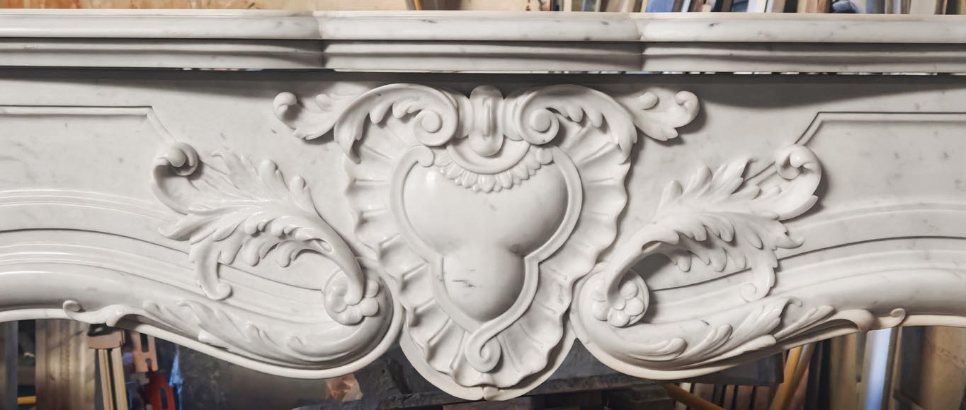 Richly decorated Louis XV style Carrara marble fireplace Richly decorated Louis XV style Carrara marble fireplace-1
