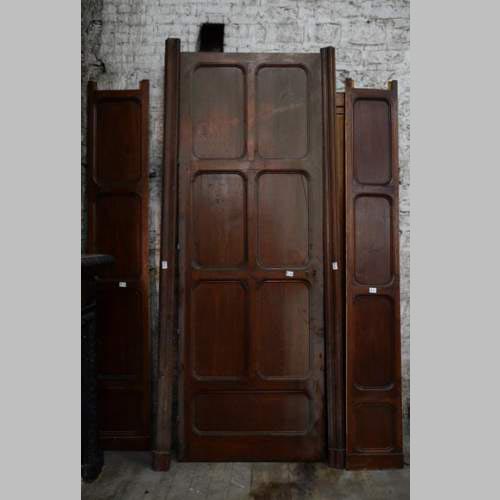 Antique large door in oak with paneled decoration, circa 1900