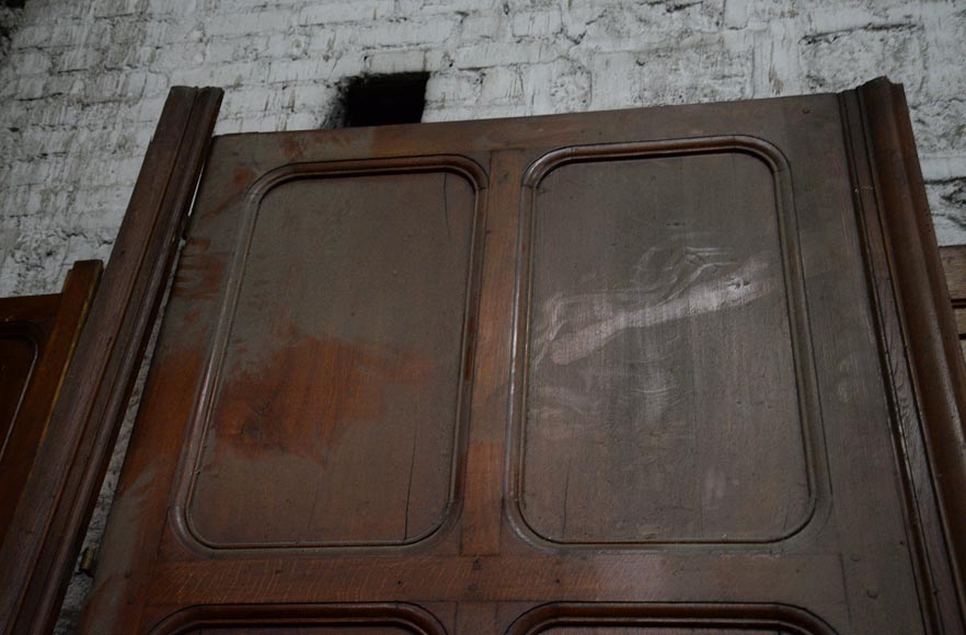 Antique large door in oak with paneled decoration, circa 1900-1