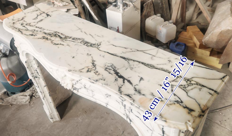 Louis XV style fireplace in Paonazzo marble decorated with a foliate shell-11