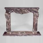 Exceptional antique Louis XV style fireplace in Fleur de Pêcher marble with large palmette