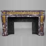 Exceptional Louis XVI style fireplace in Fior di Pesco marble with bronze ornaments