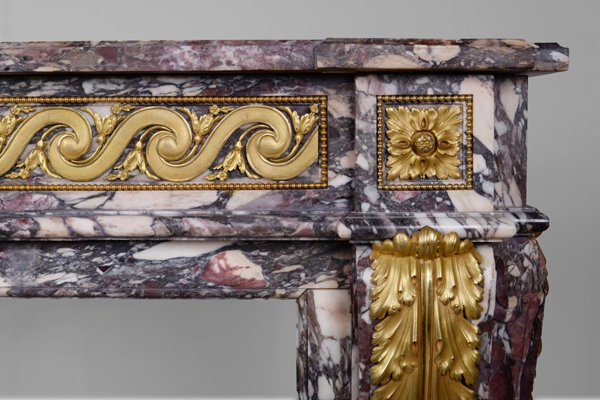 Exceptional Louis XVI style fireplace in Fior di Pesco marble with bronze ornaments-8
