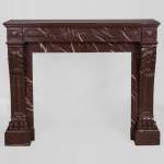 Antique Napoleon III style fireplace made out of Rouge Griotte marble with lion’s paws and Acanthus leaves