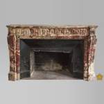 Antique Louis XVI style fireplace made out of marble with flutes