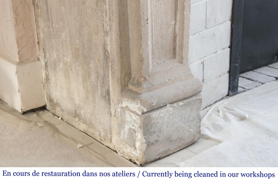 An antique Louis XVI style fireplace, made out of stone, with foliated decoration-5