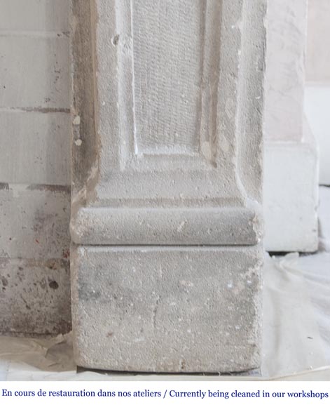 An antique Louis XVI style fireplace, made out of stone, with foliated decoration-8