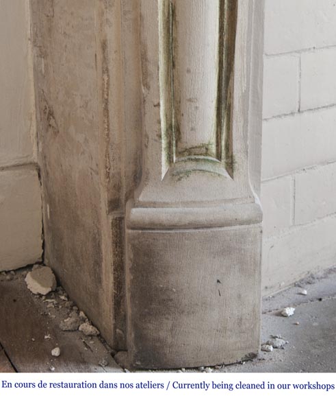 An antique Louis XV style fireplace, made out of stone-4