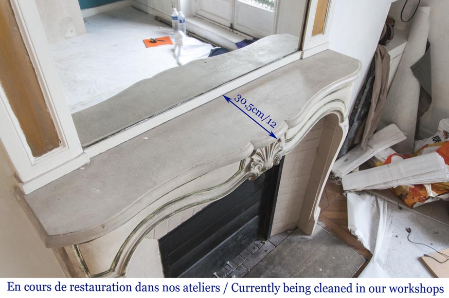 An antique Louis XV style fireplace, made out of stone-9
